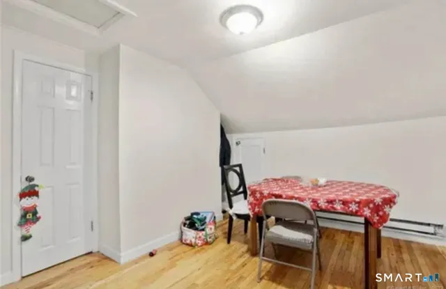 a bedroom with a bed and furniture