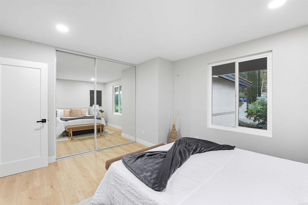 24350 Watt Road Ramona, CA 92065 - Photo 12 of 26 a bedroom with a bed and a window