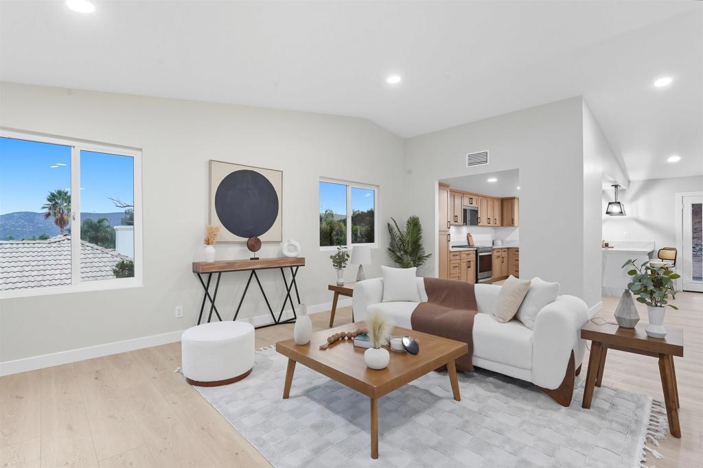 24350 Watt Road Ramona, CA 92065 - Photo 17 of 26 a living room with furniture a rug and a window