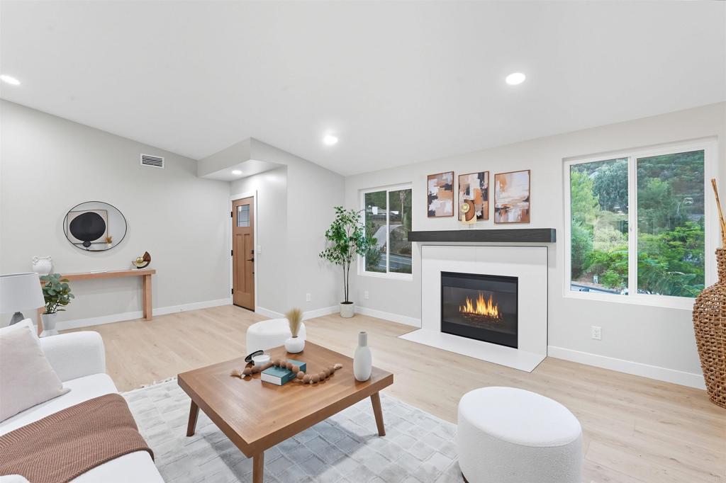 24350 Watt Road Ramona, CA 92065 - Photo 18 of 26 a living room with furniture and a fireplace