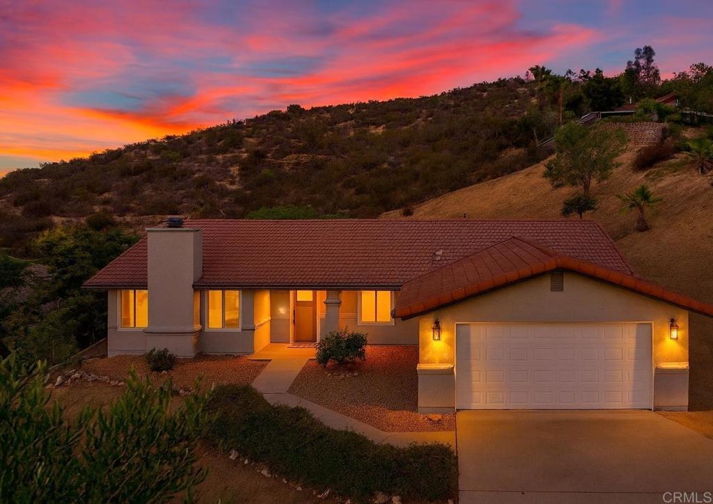 24350 Watt Road Ramona, CA 92065 - Photo 25 of 26 a front view of a house with a yard
