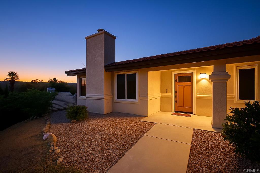 24350 Watt Road Ramona, CA 92065 - Photo 26 of 26 a house view with a garden space