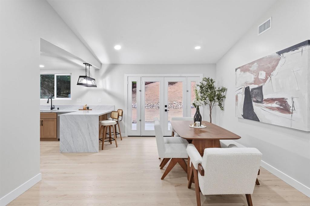 24350 Watt Road Ramona, CA 92065 - Photo 7 of 26 a view of a dining room with furniture and a livingroom
