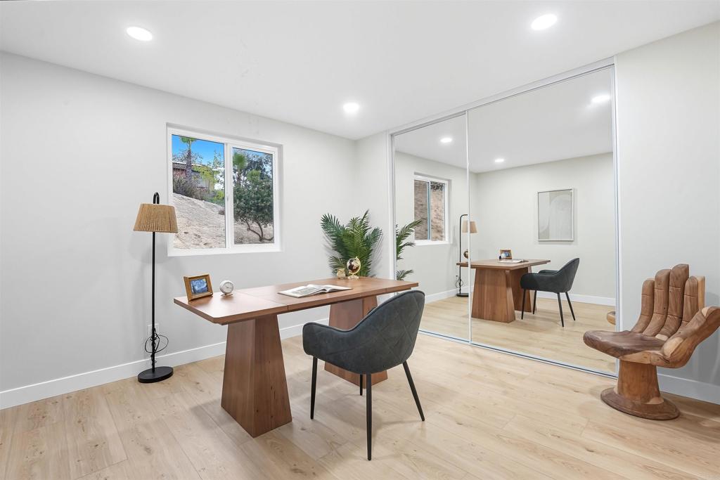 24350 Watt Road Ramona, CA 92065 - Photo 9 of 26 a view of a dining room with furniture window and wooden floor