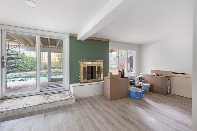 a room with furniture and a window