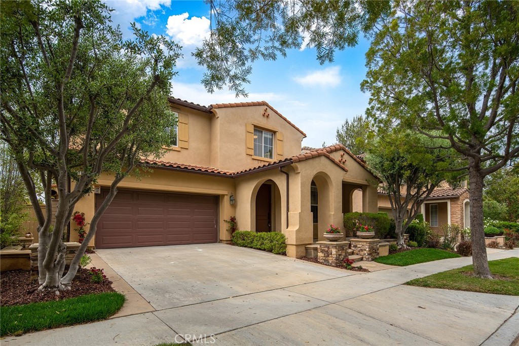 133 Treehouse Irvine, CA 92603 - Photo 1 of 1 a front view of a house with a garden