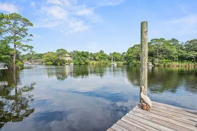 a view of a livingroom with wooden floor