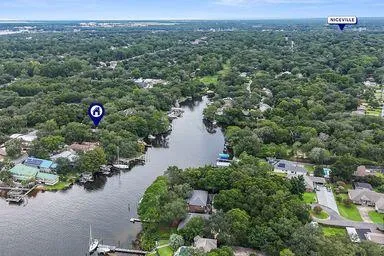 an aerial view of multiple houses with outdoor space