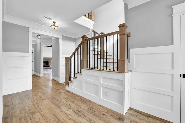 a view of entryway with wooden floor