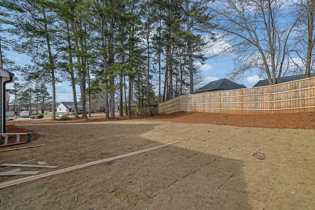 a view of the road with a building in the background