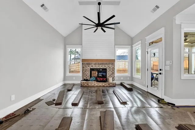 a living room with furniture with a fireplace