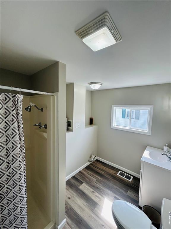 39 Murphy Street Uniontown, PA 15401 - Photo 15 of 35 a bathroom with a toilet and a shower