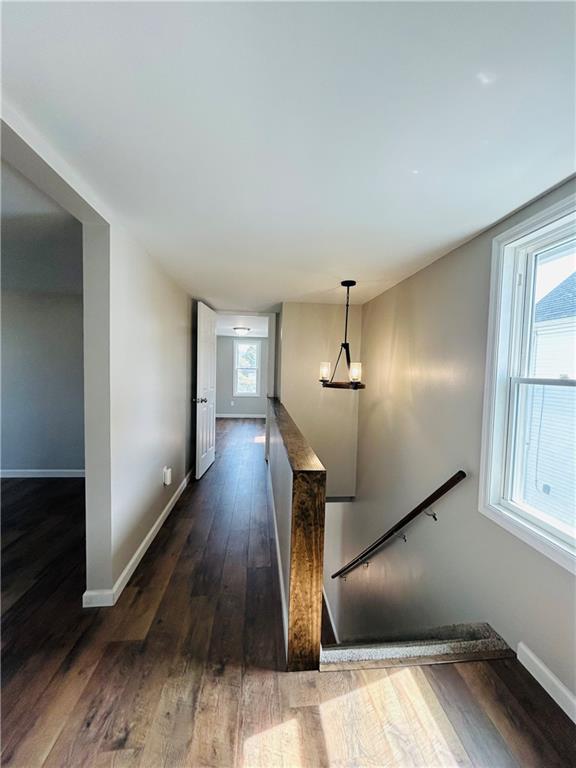 39 Murphy Street Uniontown, PA 15401 - Photo 17 of 35 wooden floor in an empty room with a mirror