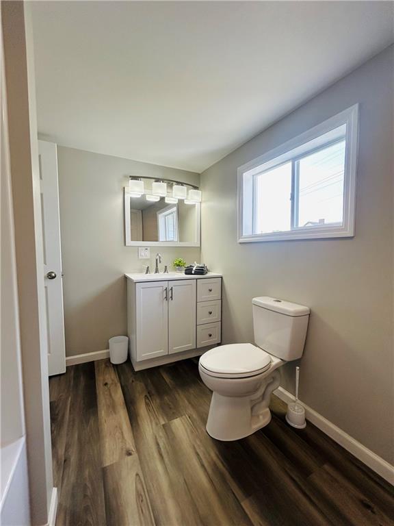 39 Murphy Street Uniontown, PA 15401 - Photo 23 of 35 a bathroom with a sink toilet mirror and window
