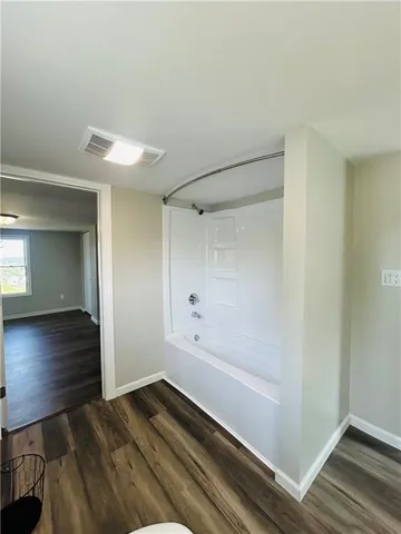 a bathroom with a bathtub