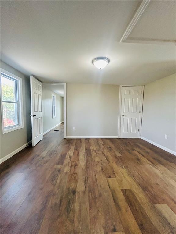 39 Murphy Street Uniontown, PA 15401 - Photo 28 of 35 an empty room with wooden floor and windows