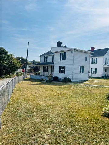 a view of a house with a swimming pool