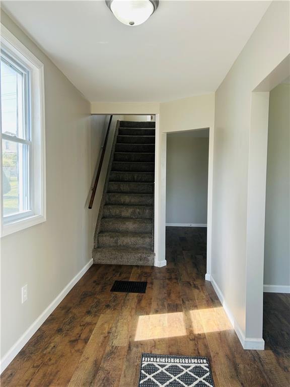 39 Murphy Street Uniontown, PA 15401 - Photo 3 of 35 a view of entryway with wooden floor and stairs