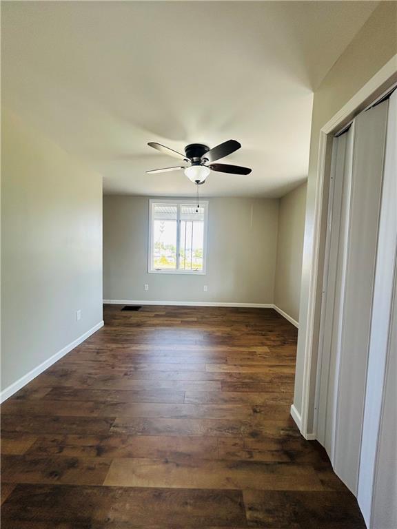 39 Murphy Street Uniontown, PA 15401 - Photo 6 of 35 an empty room with wooden floor and windows