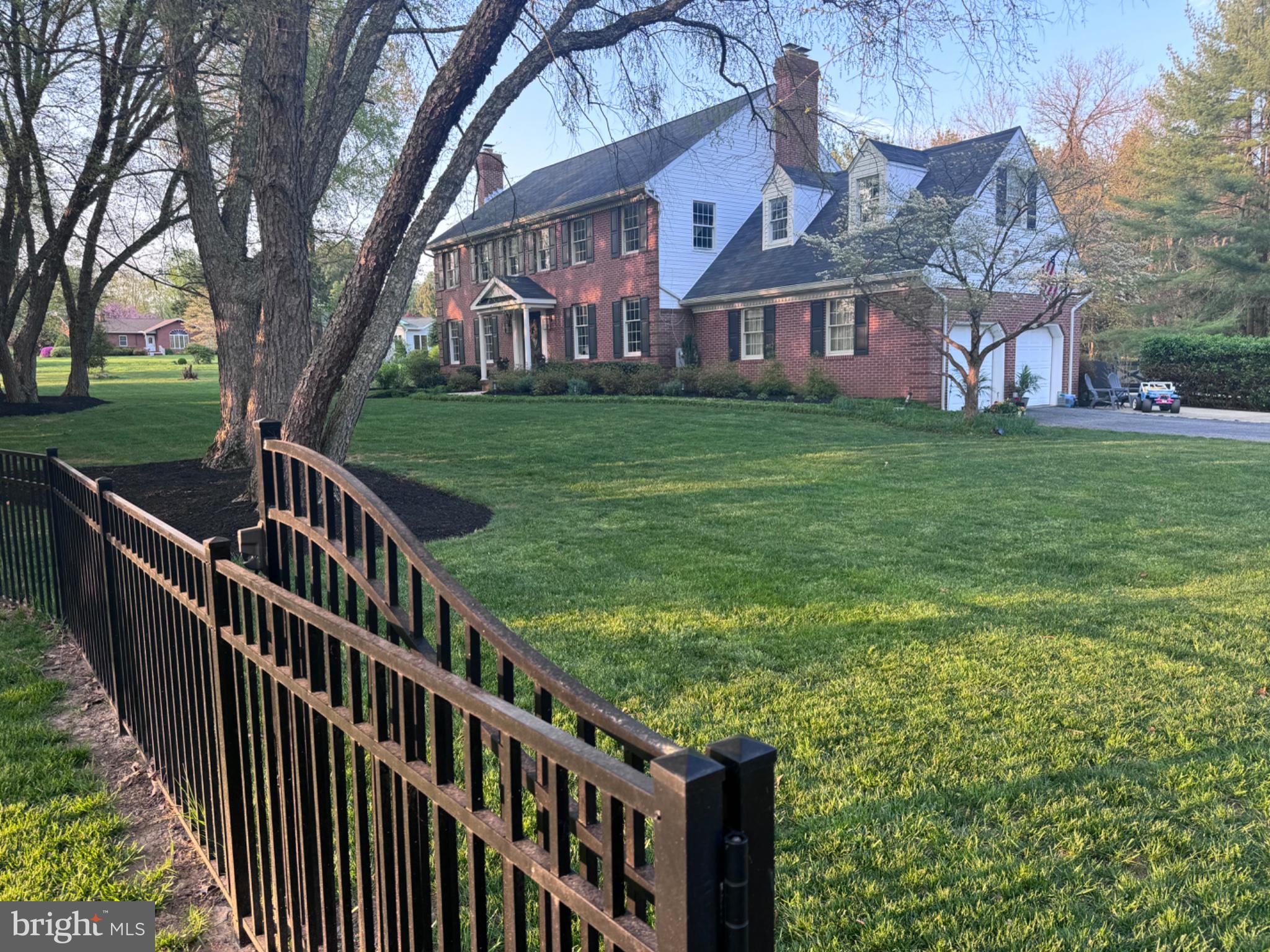 14615 Manor Road Phoenix, MD 21131 - Photo 43 of 54 Charming brick home with lush lawn.