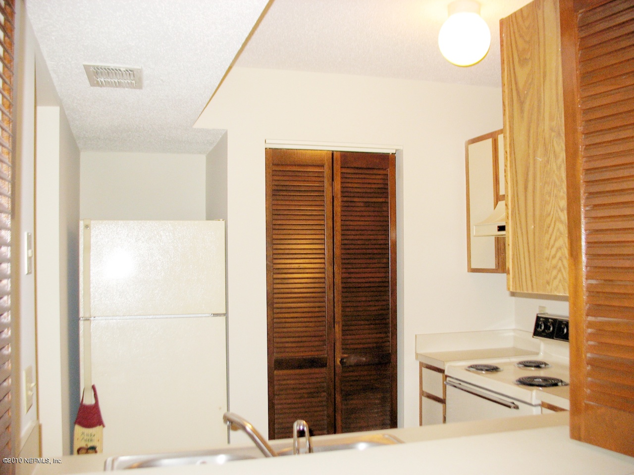 10724 Alden Road, Unit 2 Jacksonville, FL 32246 - Photo 11 of 17 Kitchen view from Dining Room