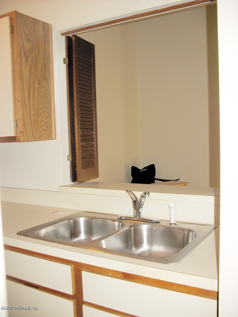 10724 Alden Road, Unit 2 Jacksonville, FL 32246 - Photo 10 of 17 Stainless steel sink & pass through