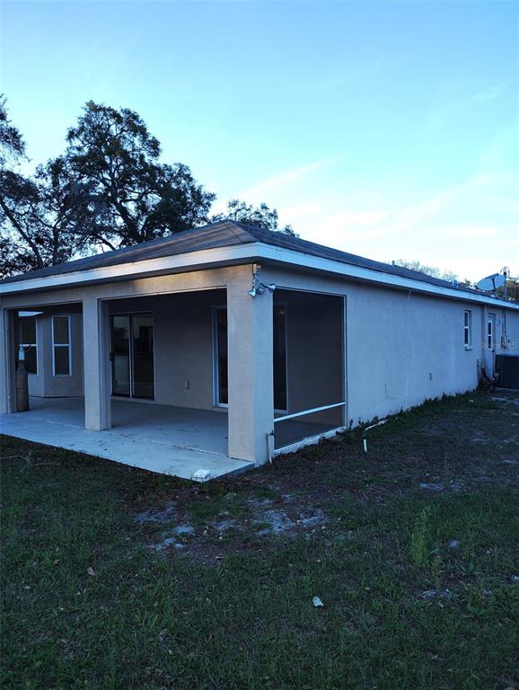 153 Rosedale Avenue Spring Hill, FL 34606 - Photo 14 of 16 a view of backyard of house