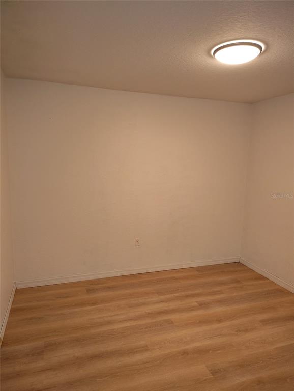 153 Rosedale Avenue Spring Hill, FL 34606 - Photo 10 of 16 a view of an empty room