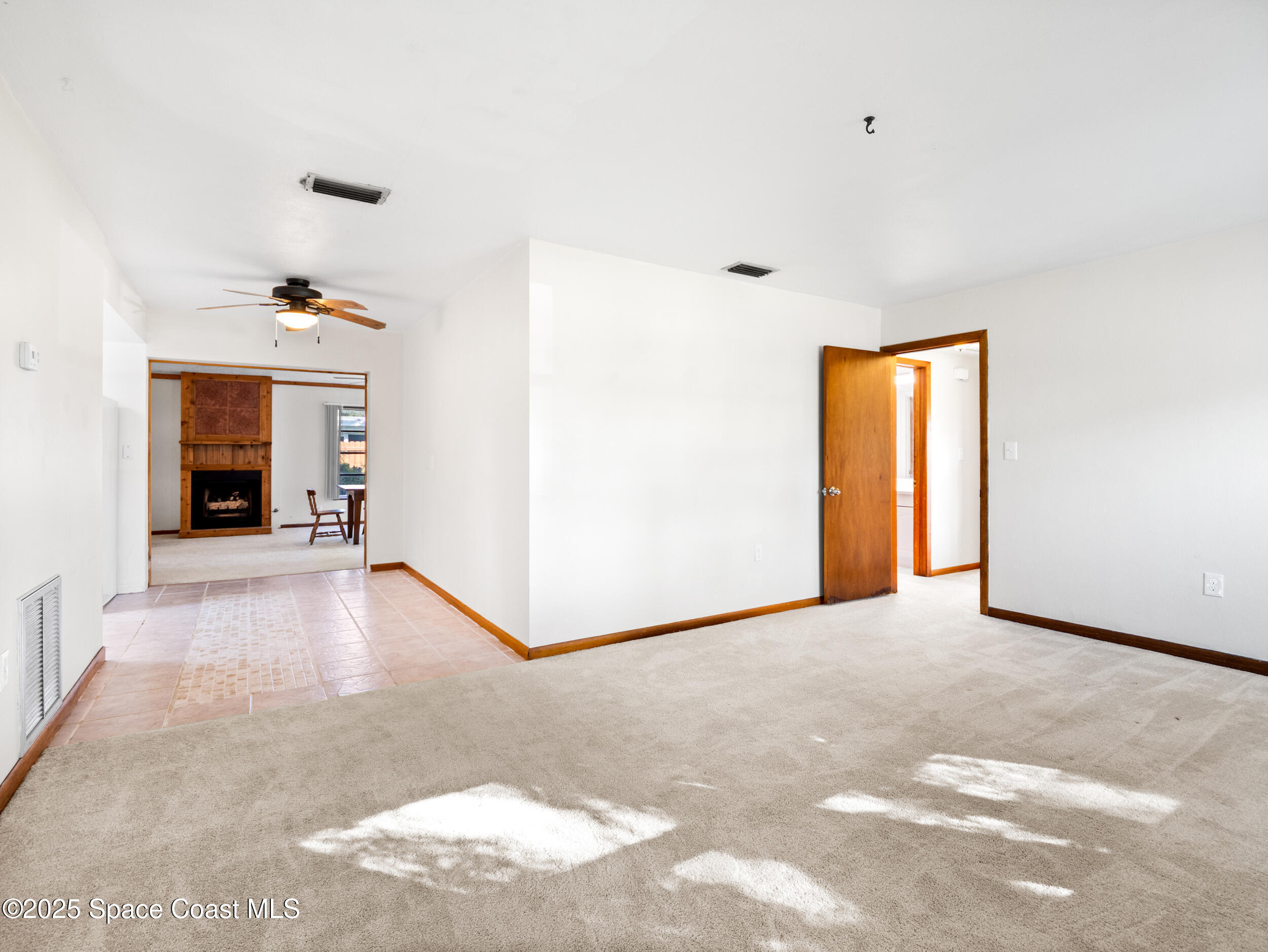 322 3rd Street Merritt Island, FL 32953 - Photo 26 of 38 a view of an empty room with a window