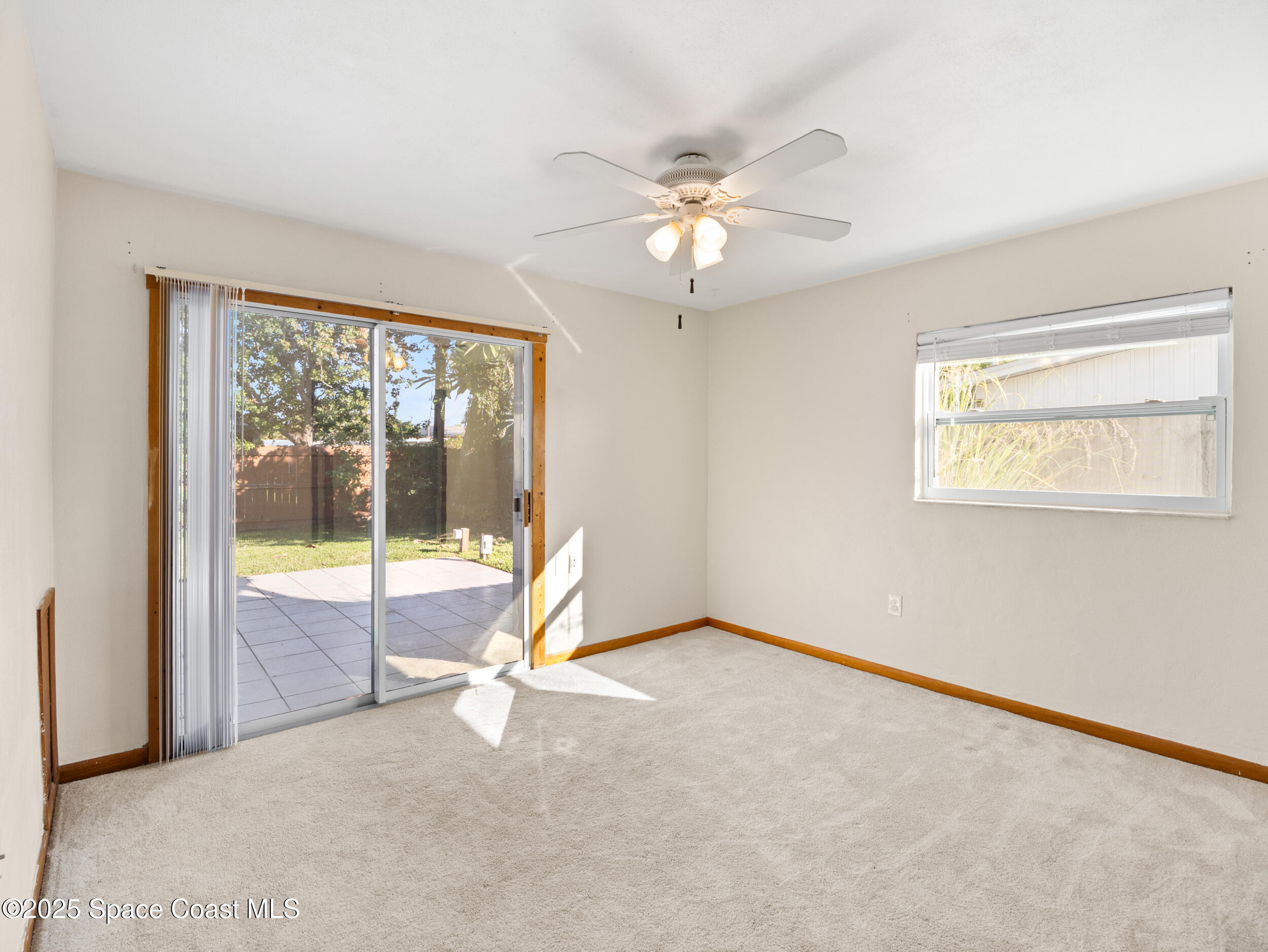 322 3rd Street Merritt Island, FL 32953 - Photo 34 of 38 a view of an empty room with a window