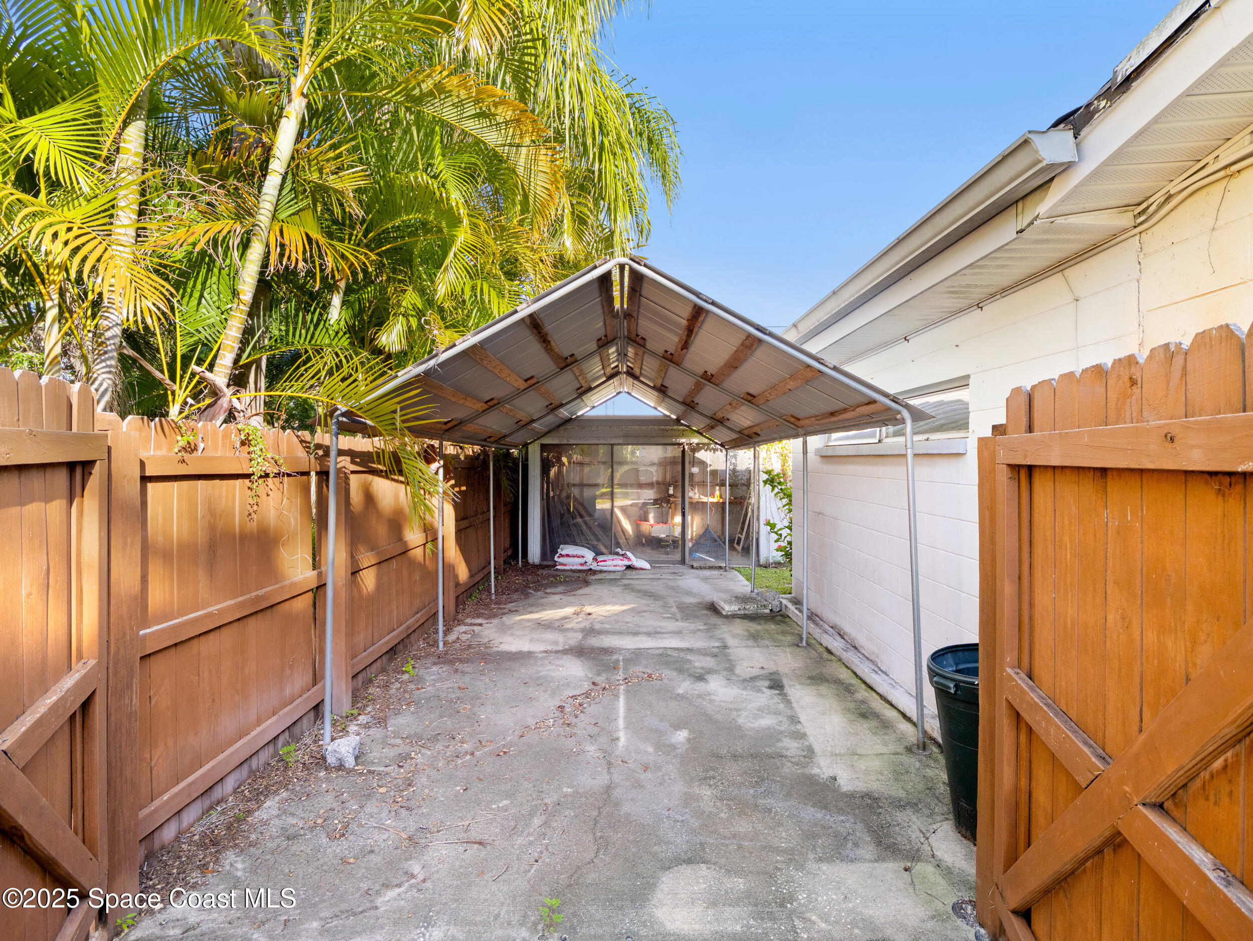 322 3rd Street Merritt Island, FL 32953 - Photo 36 of 38 a view of a backyard