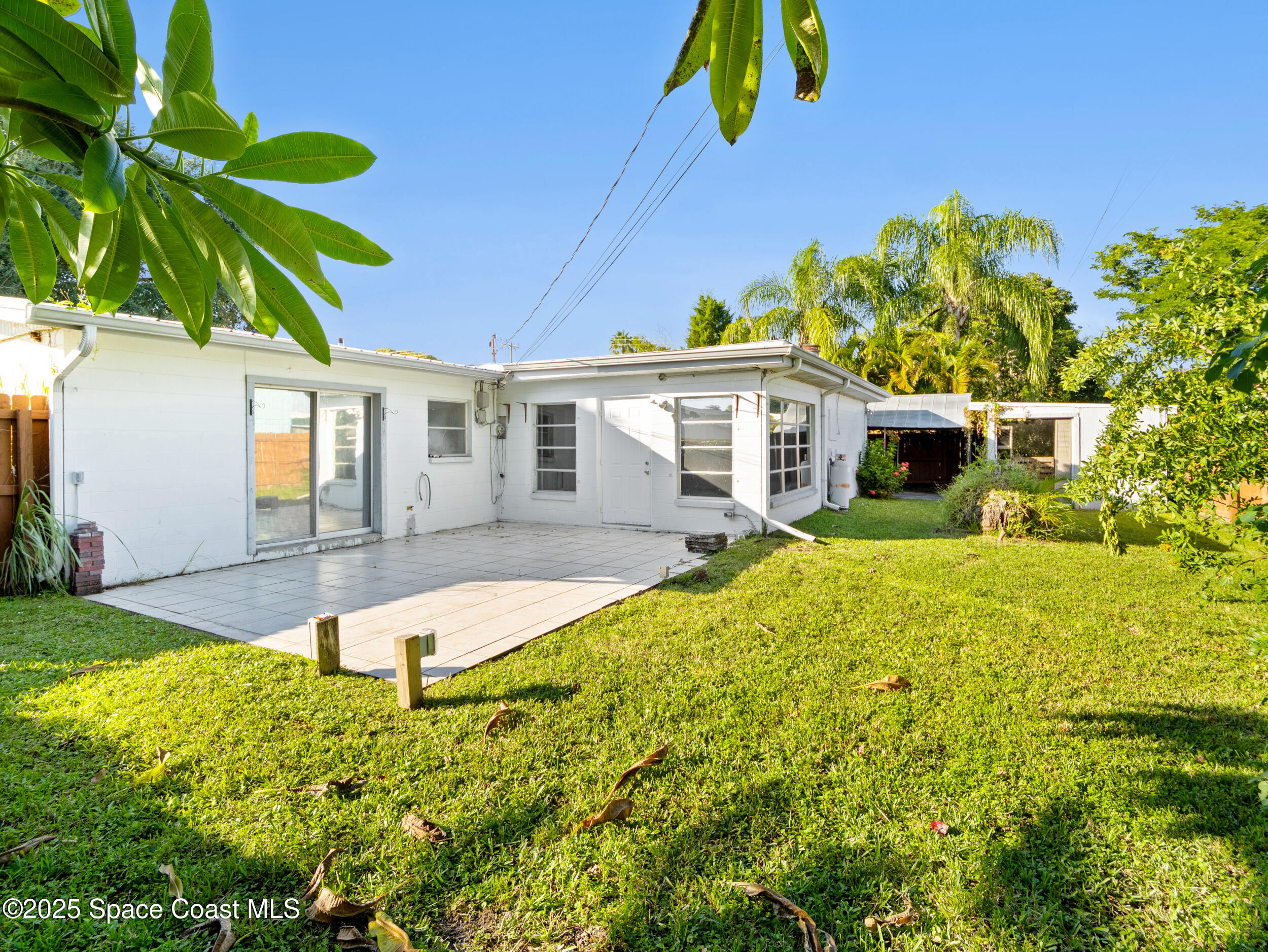 322 3rd Street Merritt Island, FL 32953 - Photo 37 of 38 a view of a house with pool