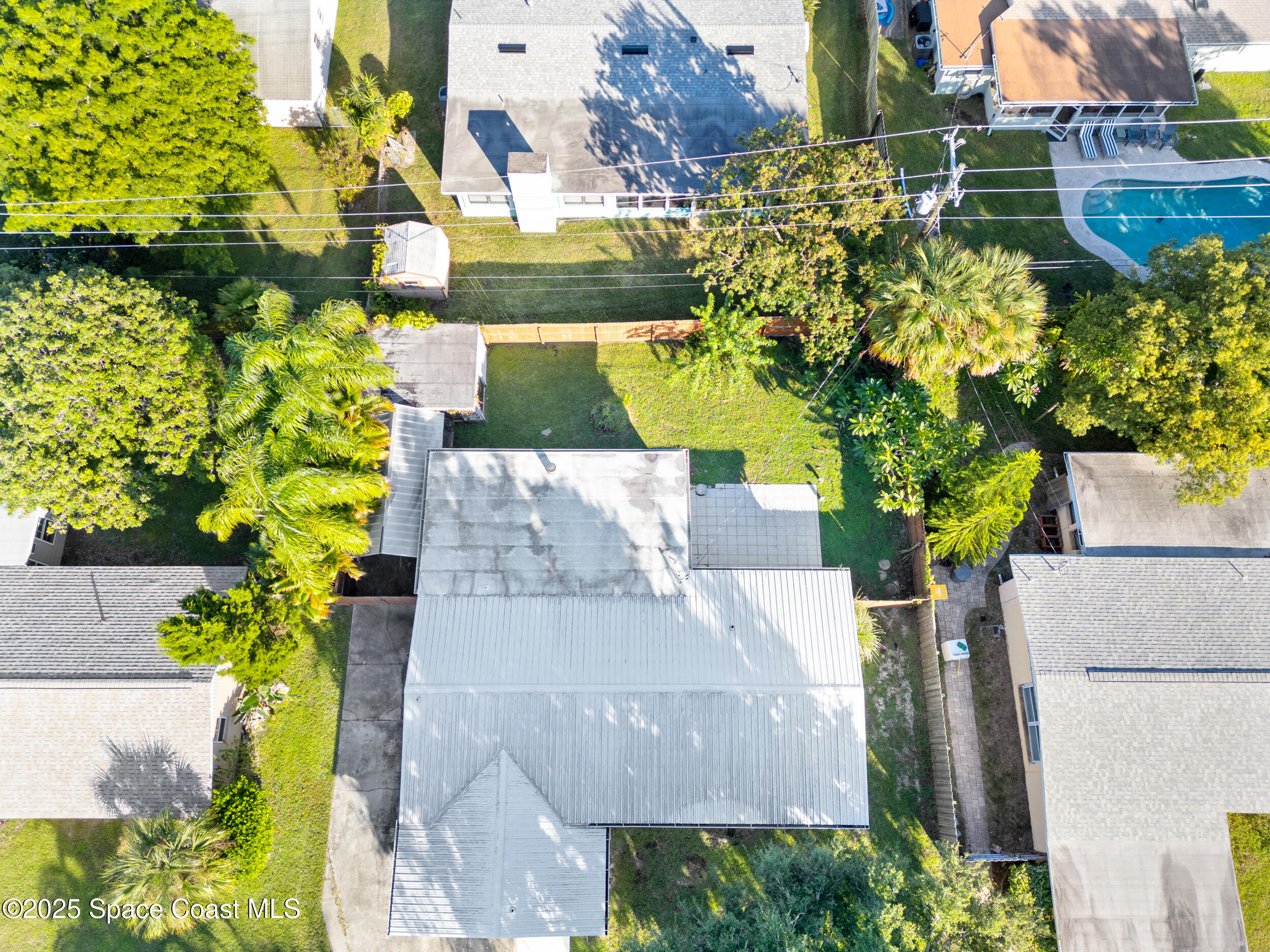 322 3rd Street Merritt Island, FL 32953 - Photo 6 of 38 a view of a yard with plants