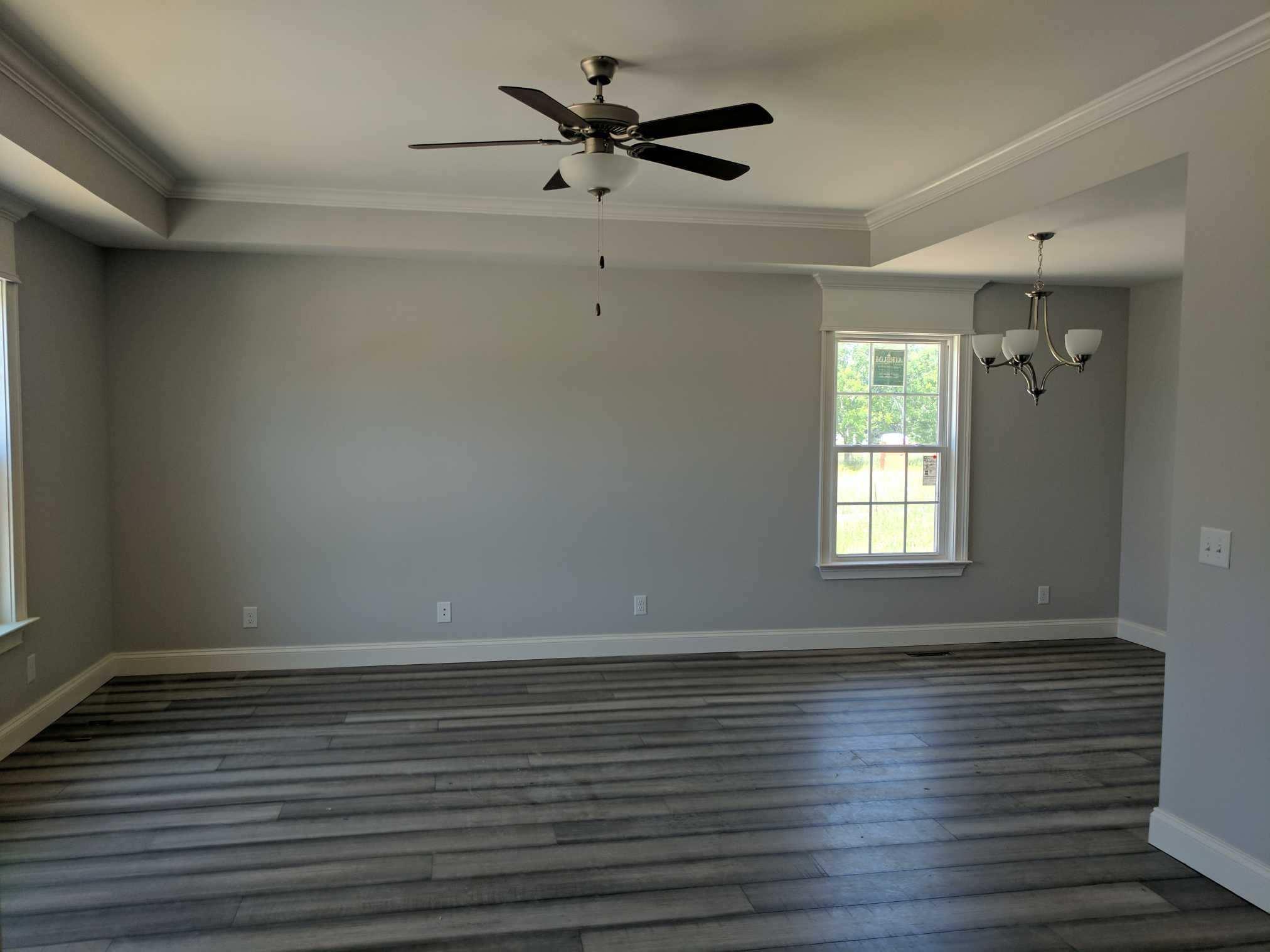 558 Corinth Road Portland, TN 37148 - Photo 2 of 10 wooden floor in an empty room with a window