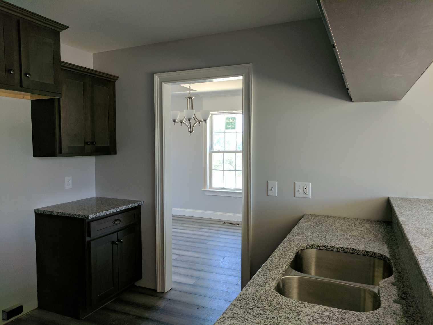 558 Corinth Road Portland, TN 37148 - Photo 3 of 10 a kitchen that has a sink and a stove top oven