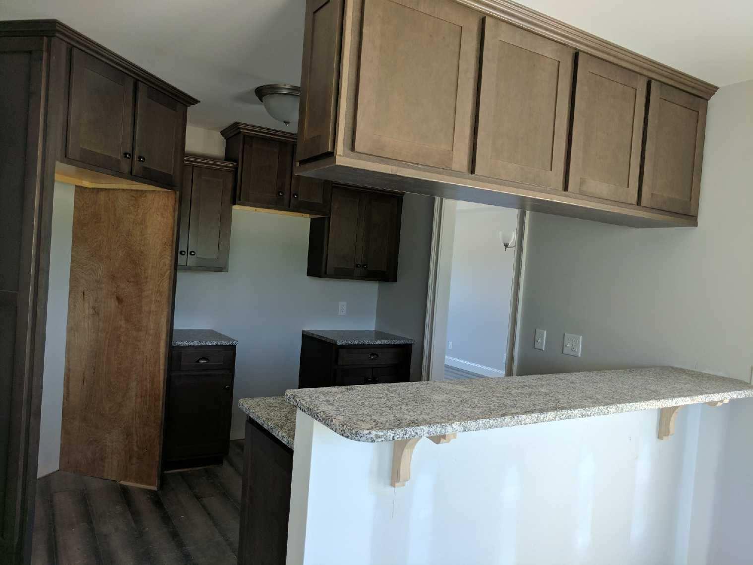 558 Corinth Road Portland, TN 37148 - Photo 4 of 10 a kitchen with stainless steel appliances granite countertop a refrigerator and a microwave