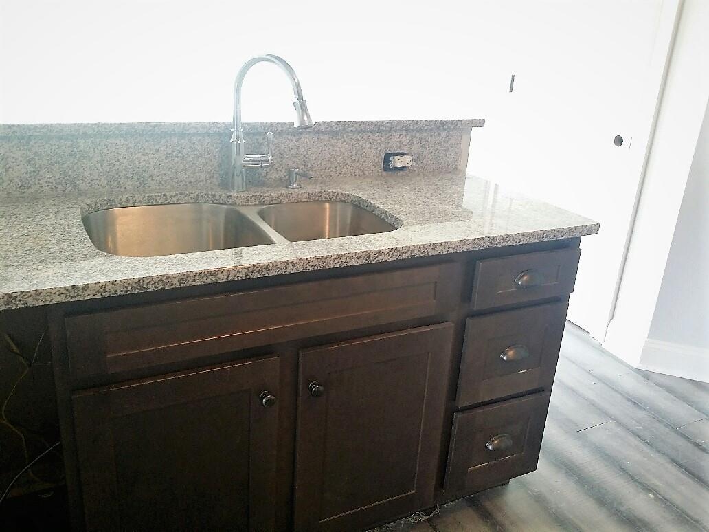 558 Corinth Road Portland, TN 37148 - Photo 6 of 10 a close view of sink and tap
