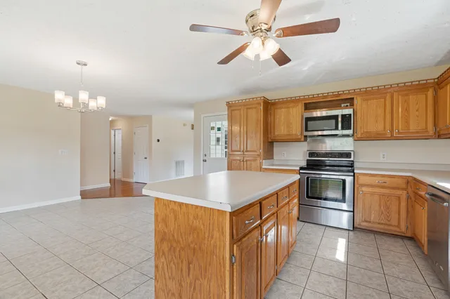 a bathroom with a toilet a sink and a bathtub