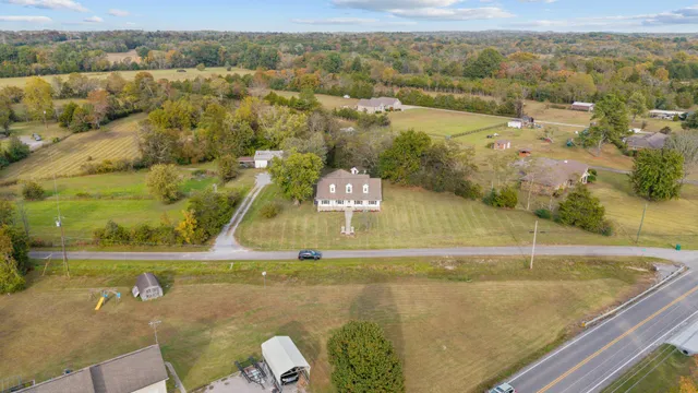 a view of kitchen with furniture and wooden floor