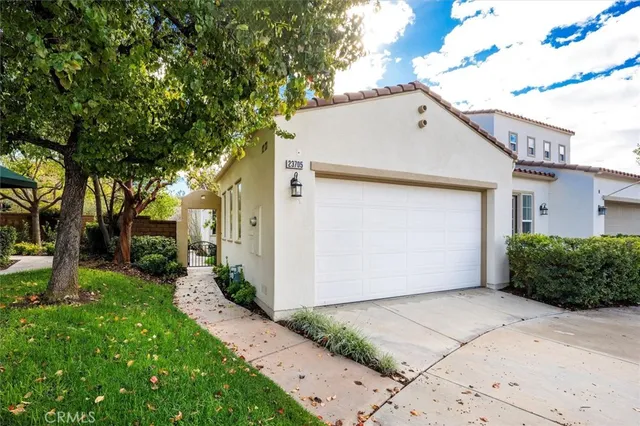 a view of a house with a garage