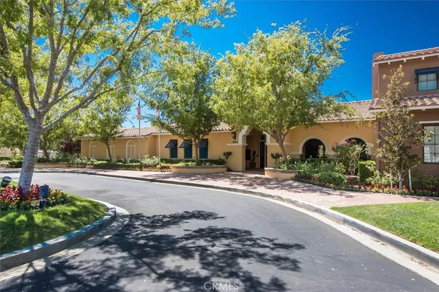 a living room with lots of furniture and a flat screen tv