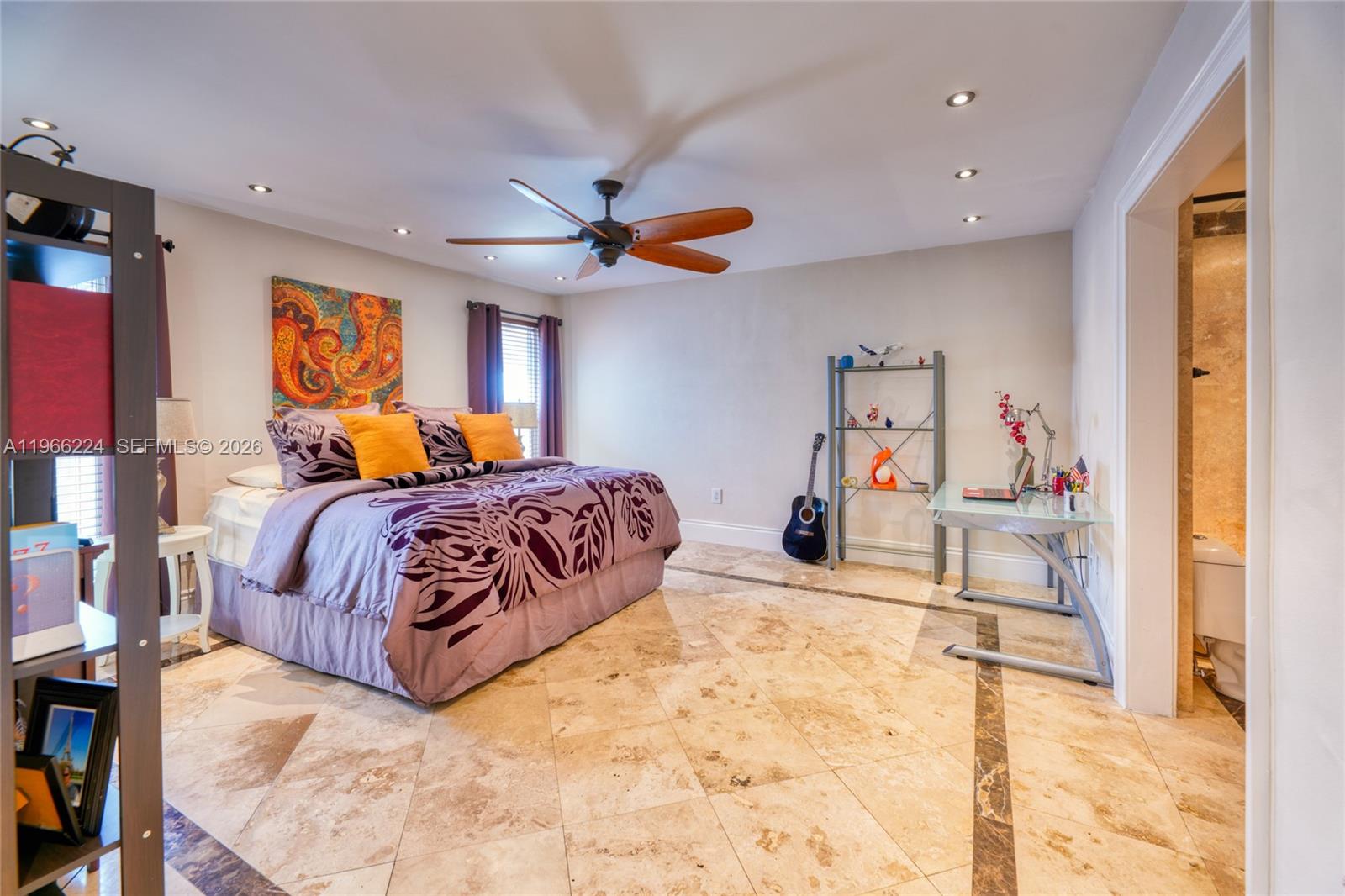 5826 Southwest 17th Street Miami, FL 33155 - Photo 17 of 46 a bedroom with furniture and a flat screen tv