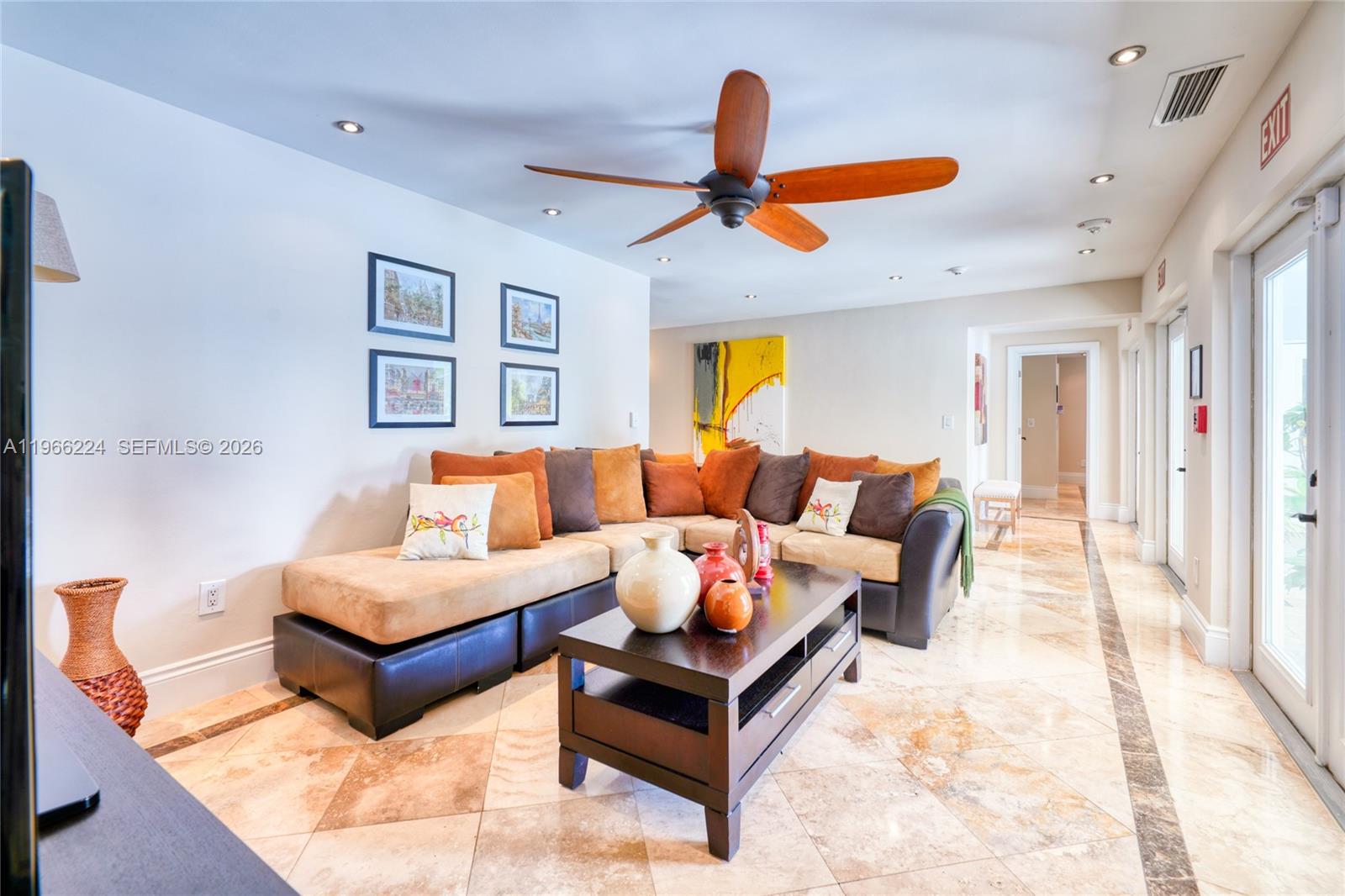 5826 Southwest 17th Street Miami, FL 33155 - Photo 34 of 46 a living room with furniture and a large window