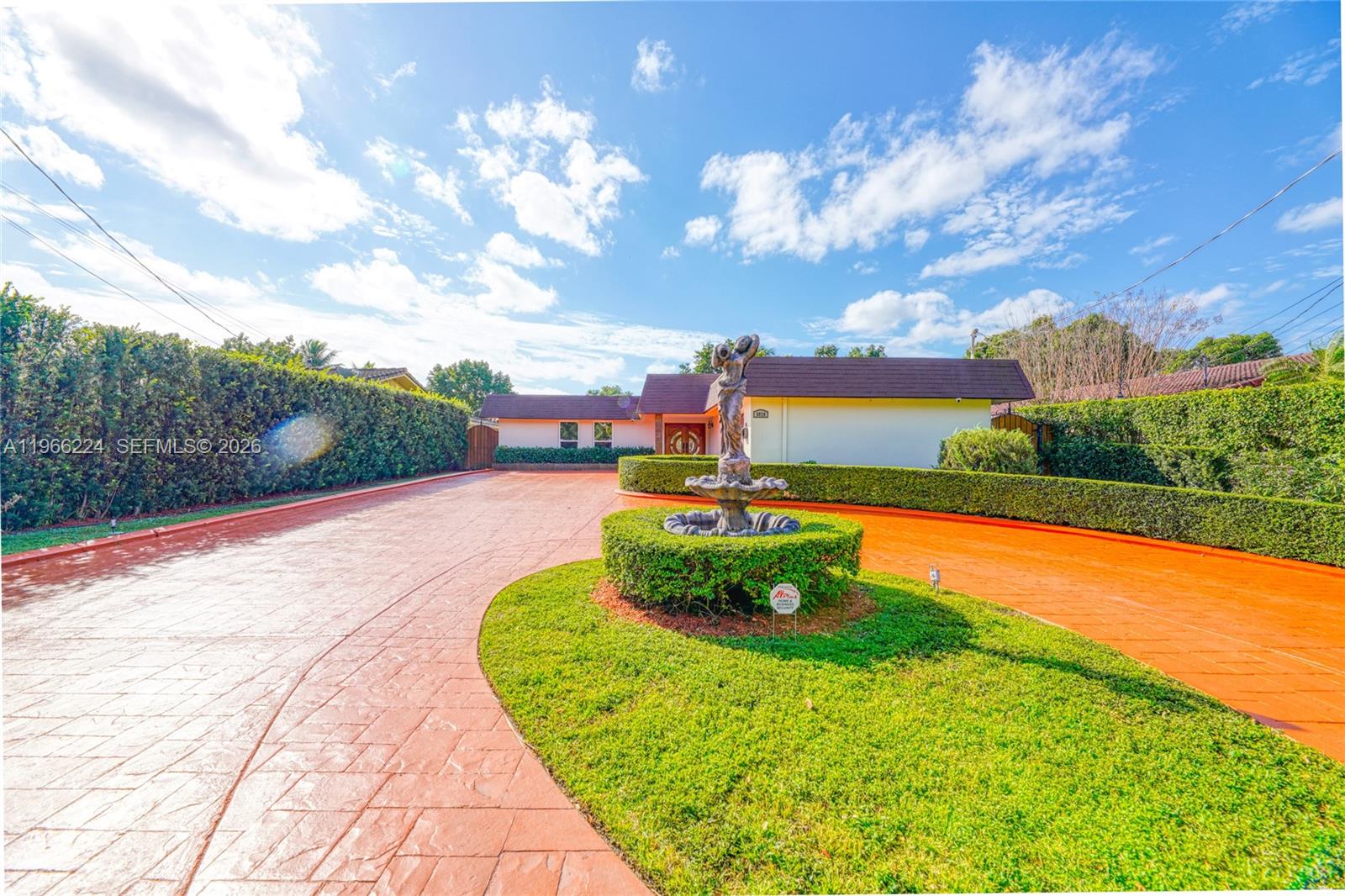 5826 Southwest 17th Street Miami, FL 33155 - Photo 45 of 46 a view of a swimming pool with a yard