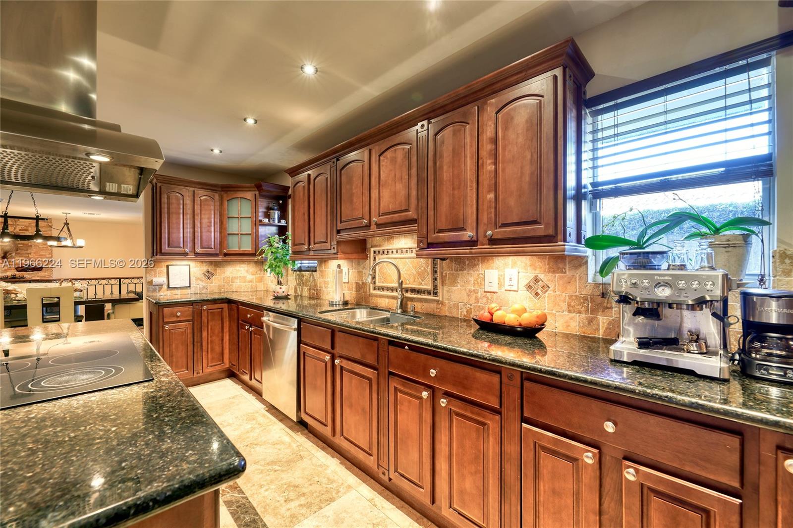 5826 Southwest 17th Street Miami, FL 33155 - Photo 6 of 46 a kitchen with granite countertop lots of counter top space