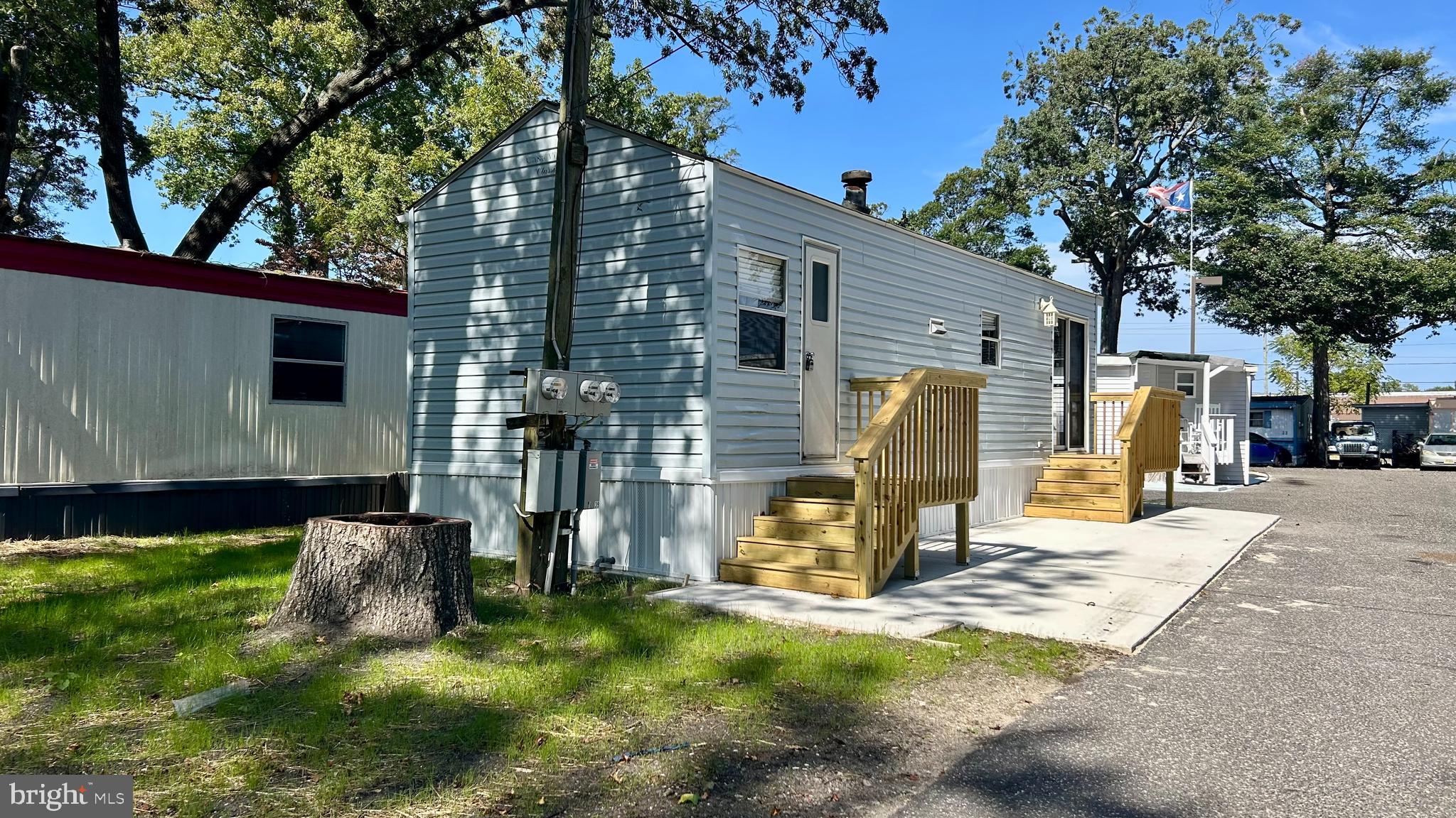 104 South 5th Avenue, Unit 39 Rio Grande, NJ 08242 - Photo 20 of 20 a view of a house with backyard and sitting area