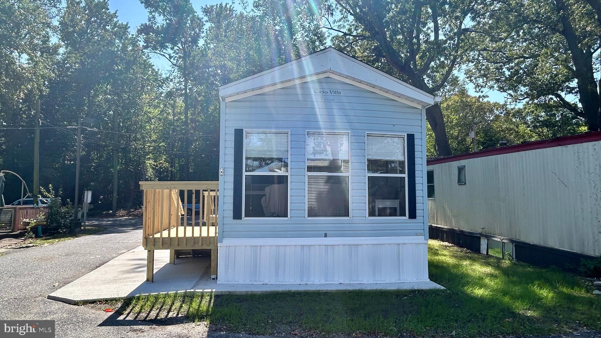 104 South 5th Avenue, Unit 39 Rio Grande, NJ 08242 - Photo 2 of 20 a view of an house with backyard space and balcony