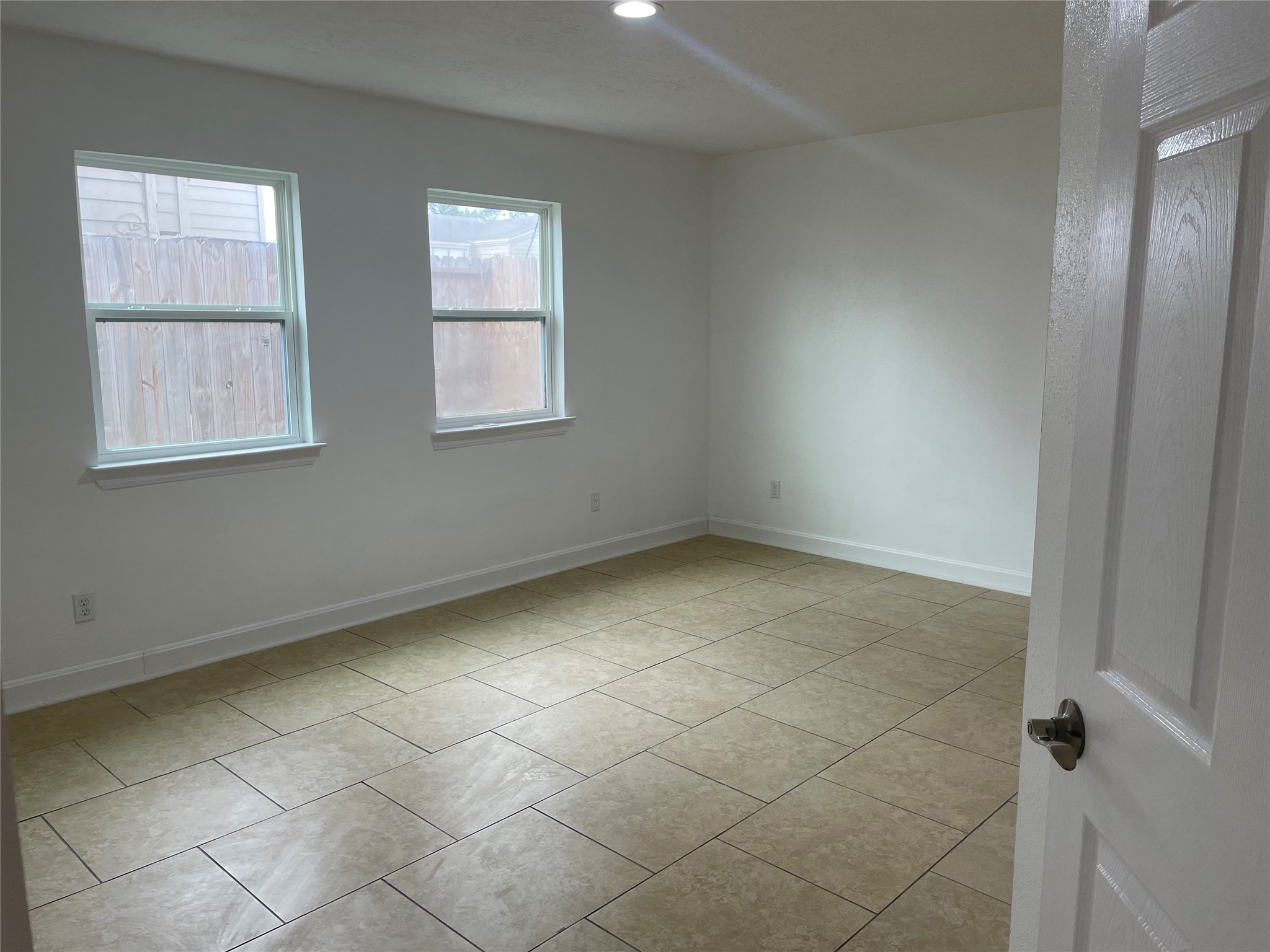 11630 Coachfield Lane Houston, TX 77035 - Photo 14 of 18 a view of an empty room with a window