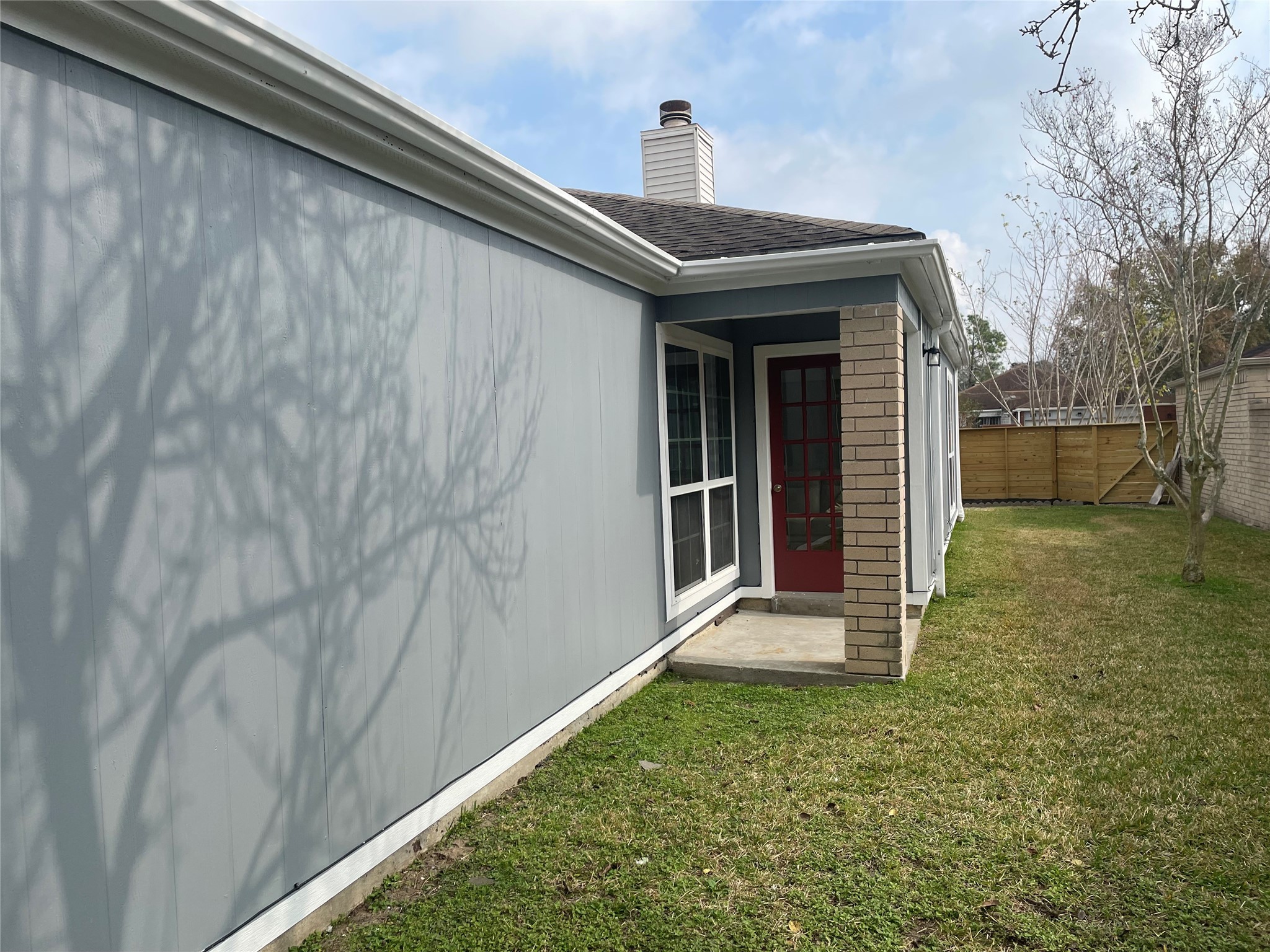 11630 Coachfield Lane Houston, TX 77035 - Photo 17 of 18 a front view of a house with a yard
