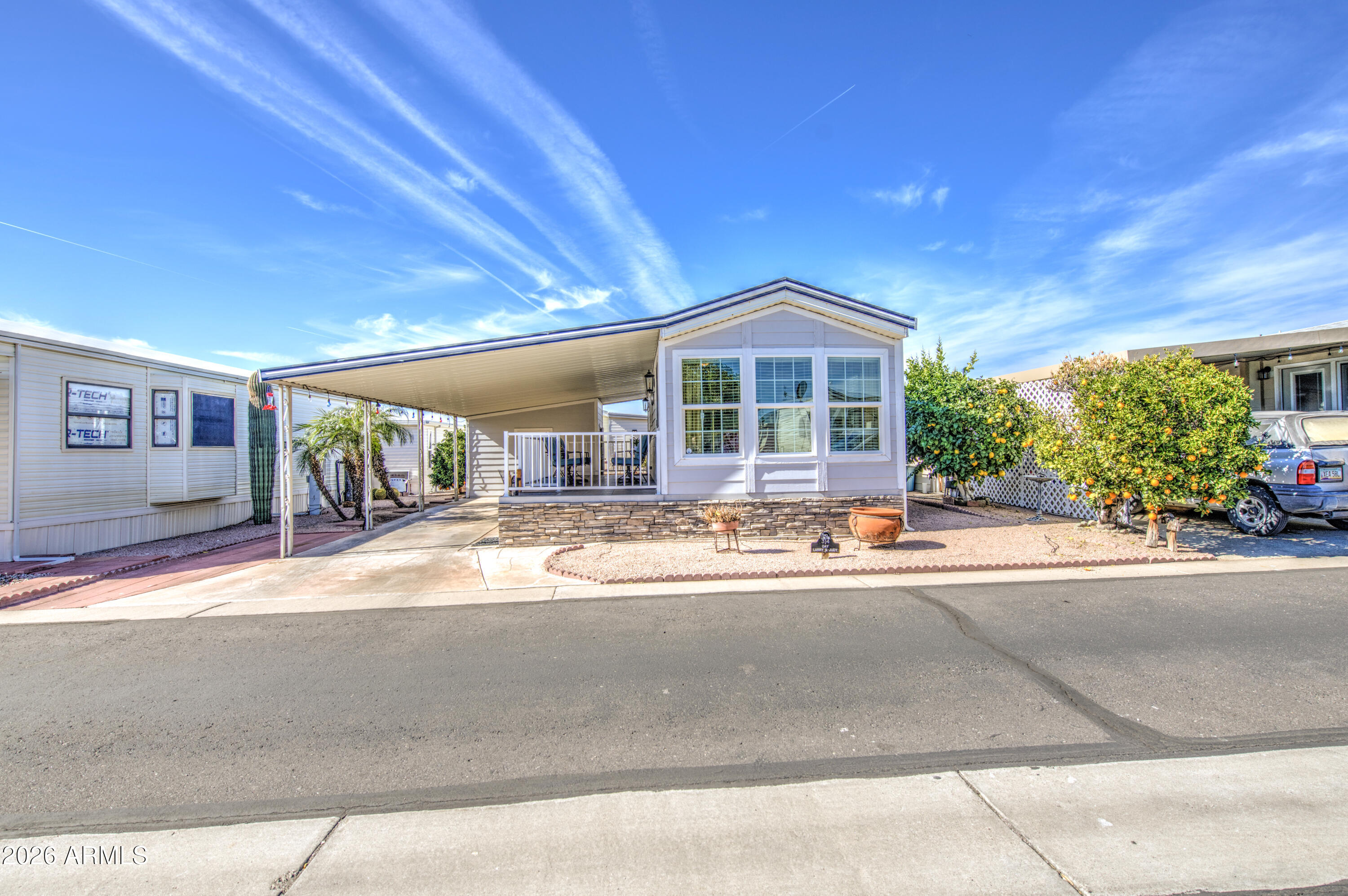 7750 East Broadway Road, Unit 314 Mesa, AZ 85208 - Photo 16 of 32 a view of a house with a patio